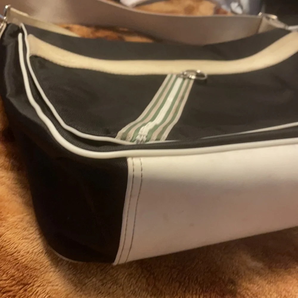 Lacoste Black Messenger Bag with White Trim and Green Logo